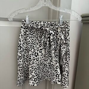 Black and white leopard print skirt with a frill detail and tie waist